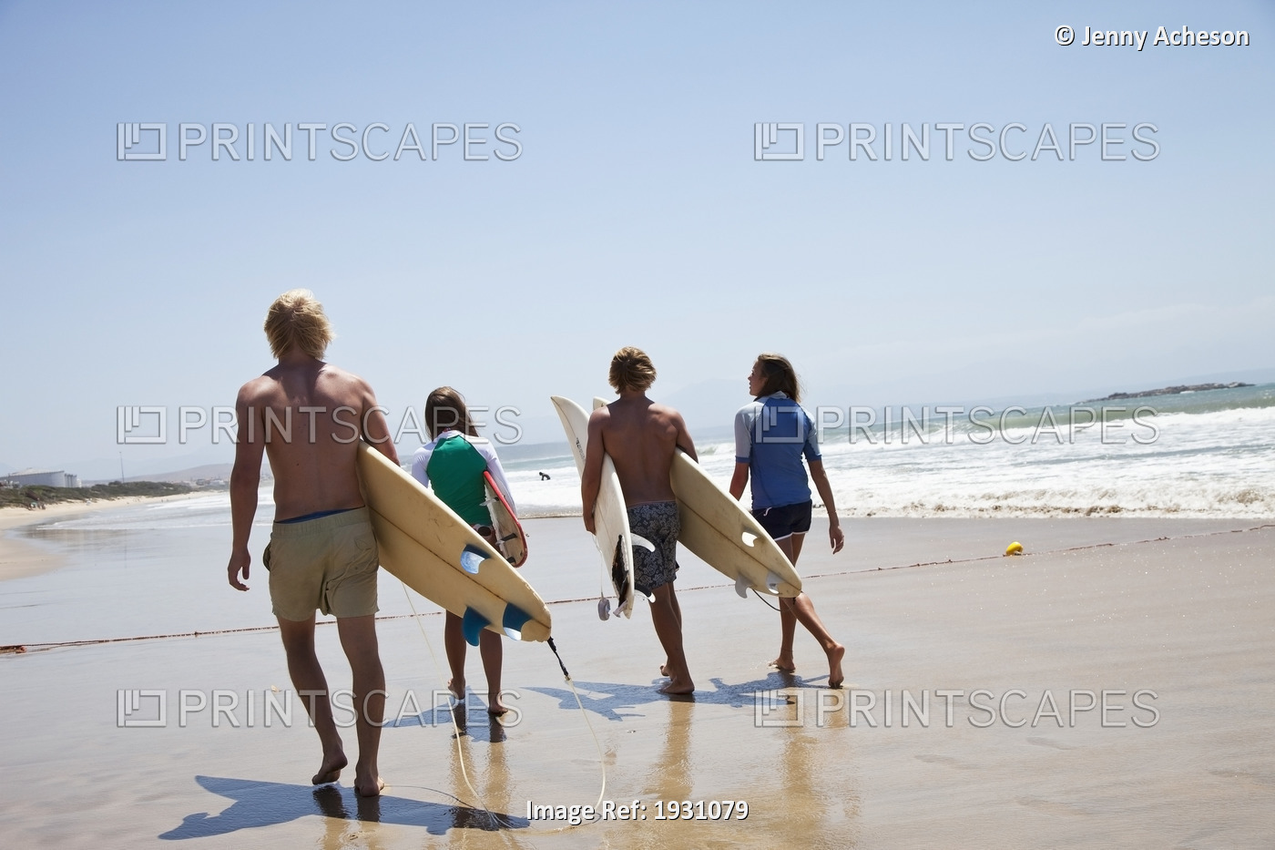 Surfers On The Beach, Mossel Bay, South Africa; 4 Surfers Walking Along Beach, ...