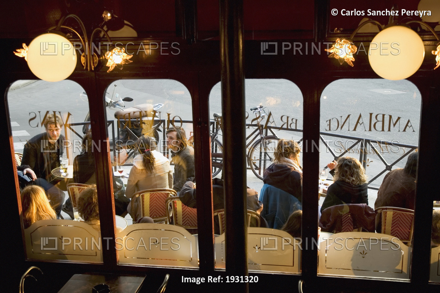 High Angle View Through Windows Of Students Sitting Outside Cafe, Paris, ...