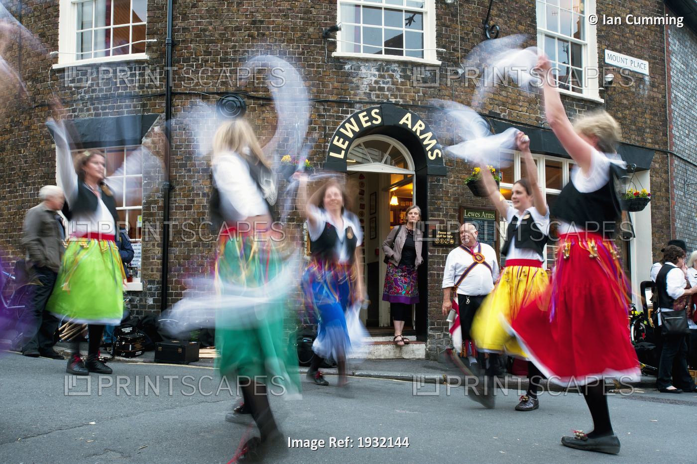 UK, East Sussex, Morris Dancing on street; Lewe
