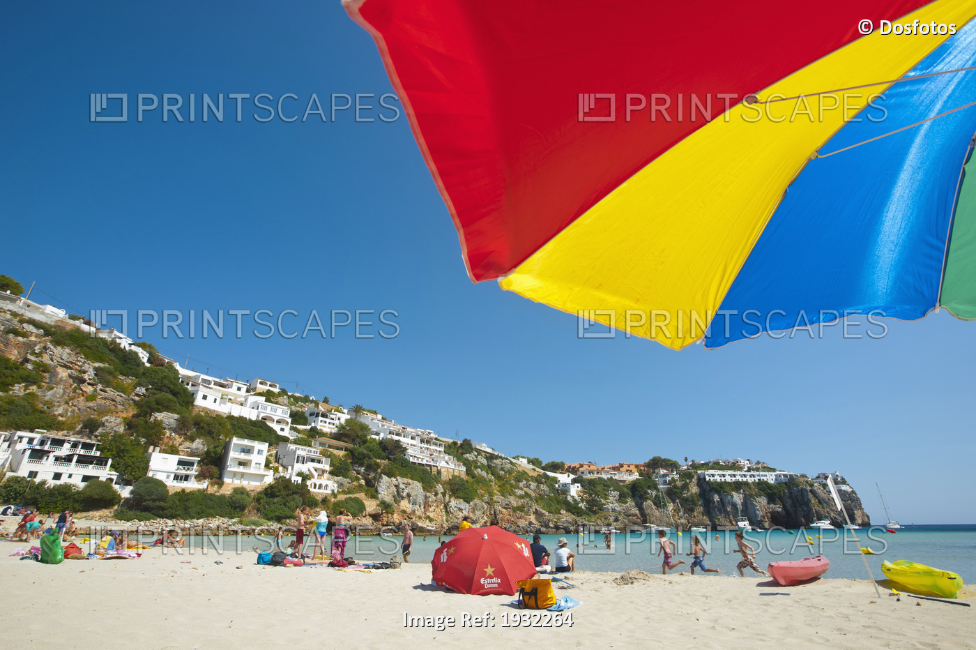 Under The Umbrella In Cala En Porter, Menorca, Balearic Islands, Spain