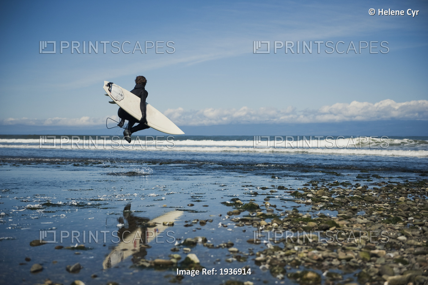 A Man Walks With His Surfboard Down The Beach; Washington Peninsula Washington ...
