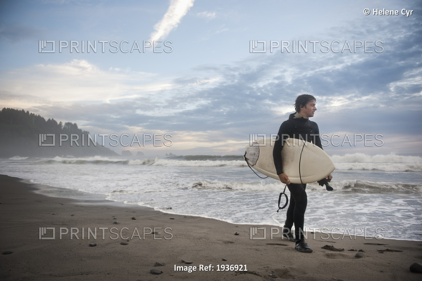 A Young Man Carries His Surfboard Down The Beach; La Push Washington United ...