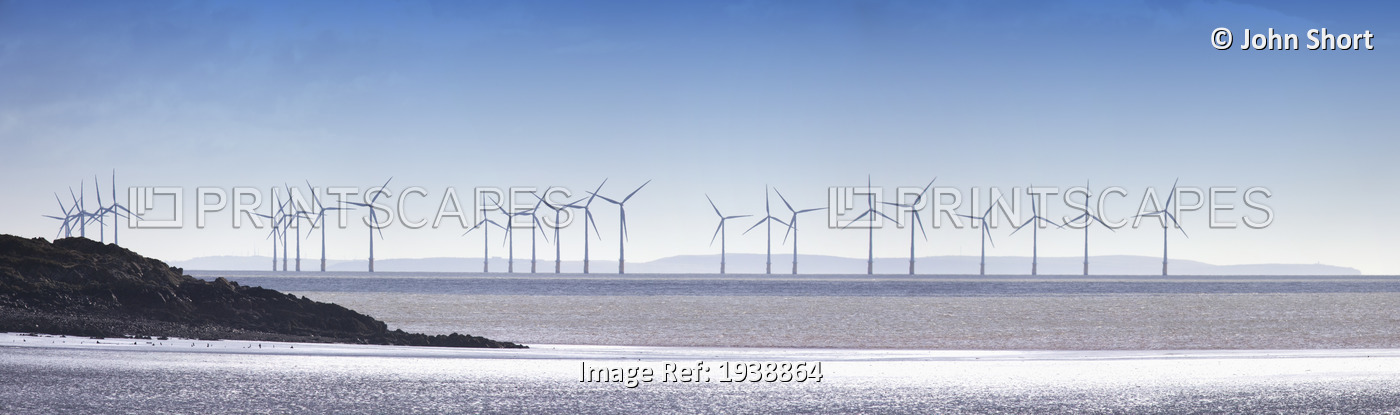 Wind Turbines Along The Coast; Solway Firth Dumfries Scotland