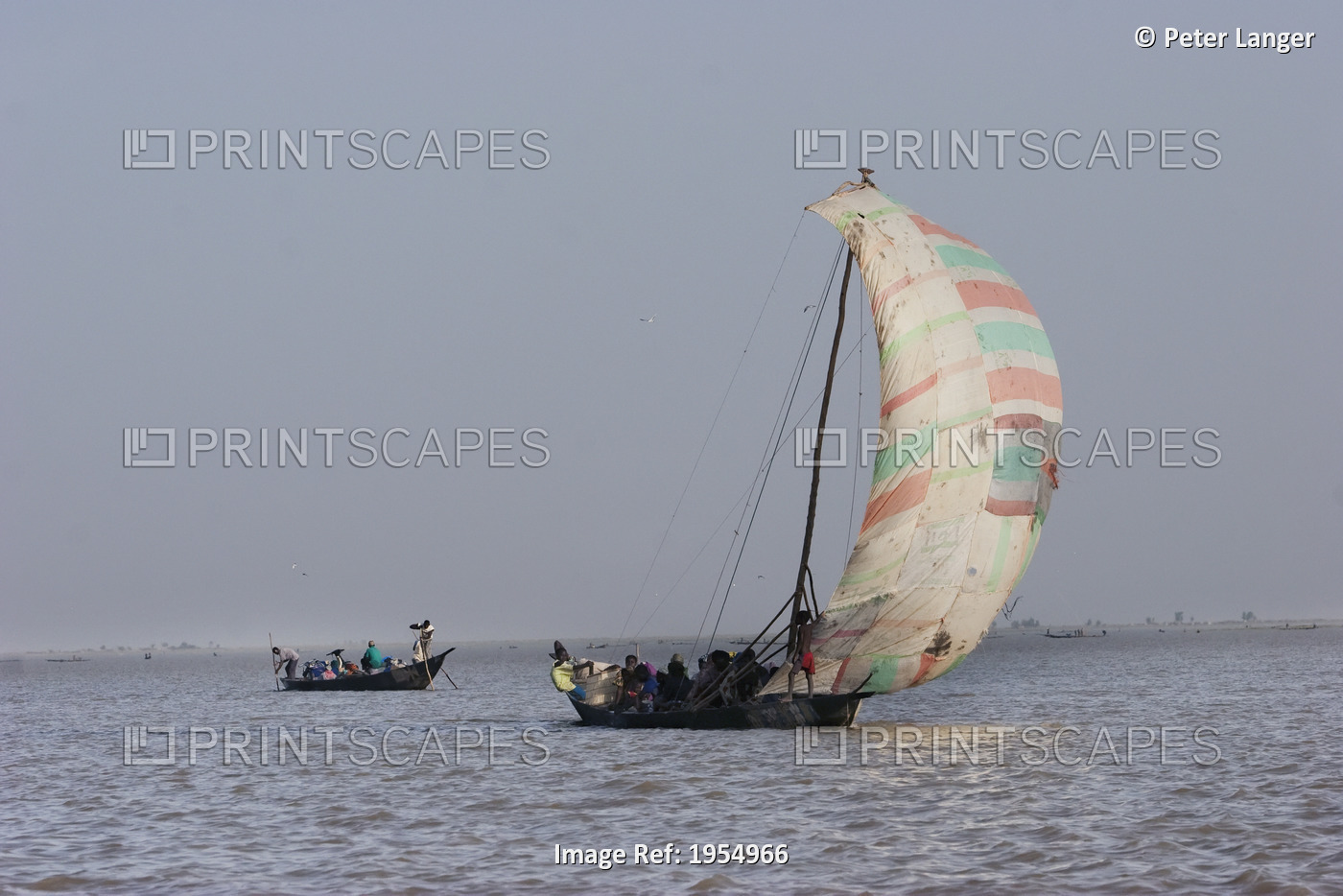 Sail boat on Lake Debo, formed by the seasonal flooding of the Niger River, Mali