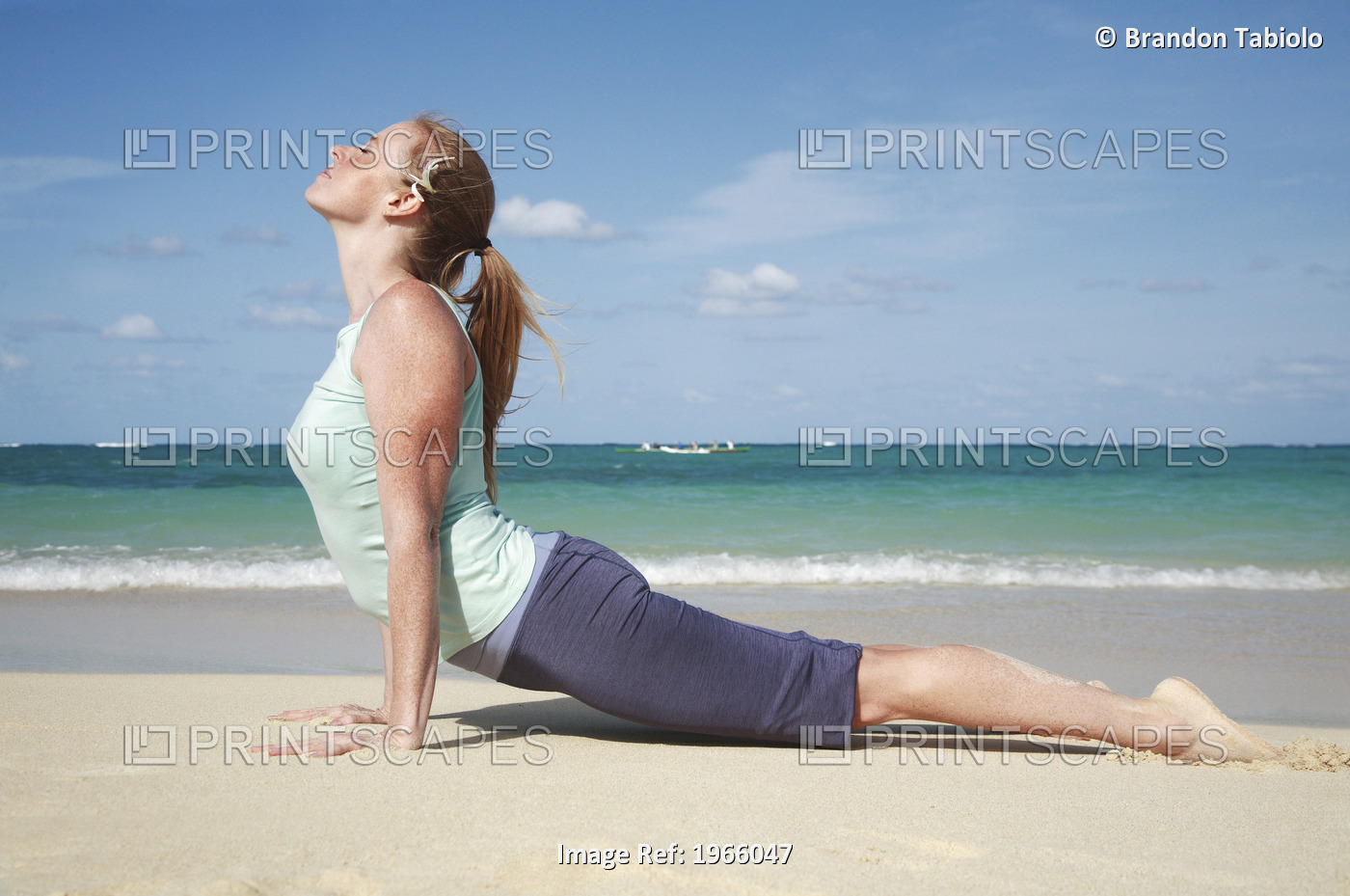 Hawaii, Oahu, Lanikai, Young Woman Does Yoga On Beach.