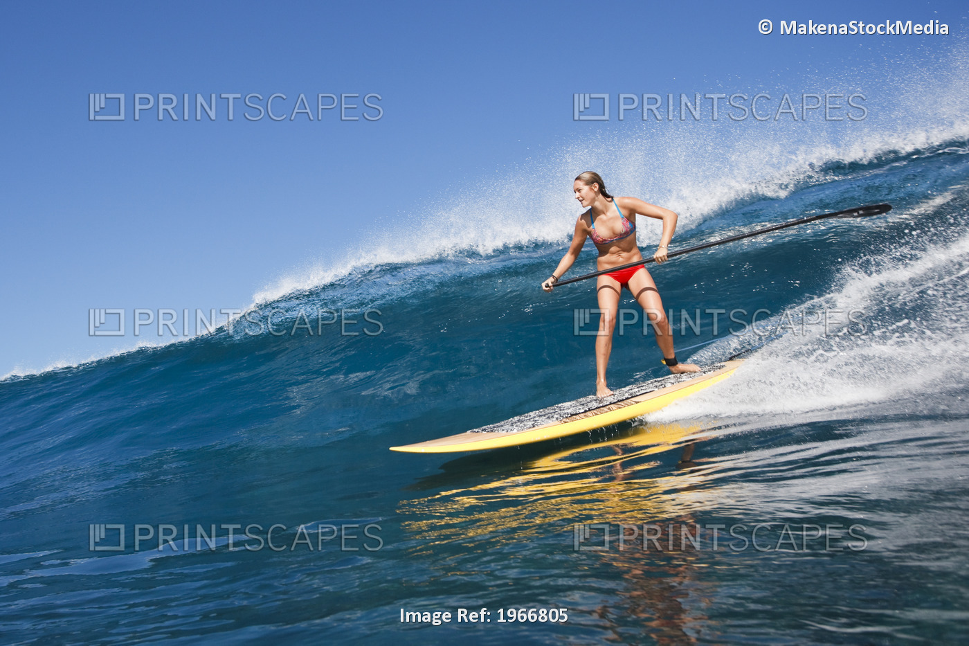 Hawaii, Maui, Paia, Female Stand Up Paddle Boarder Rides A Wave On Maui's North ...