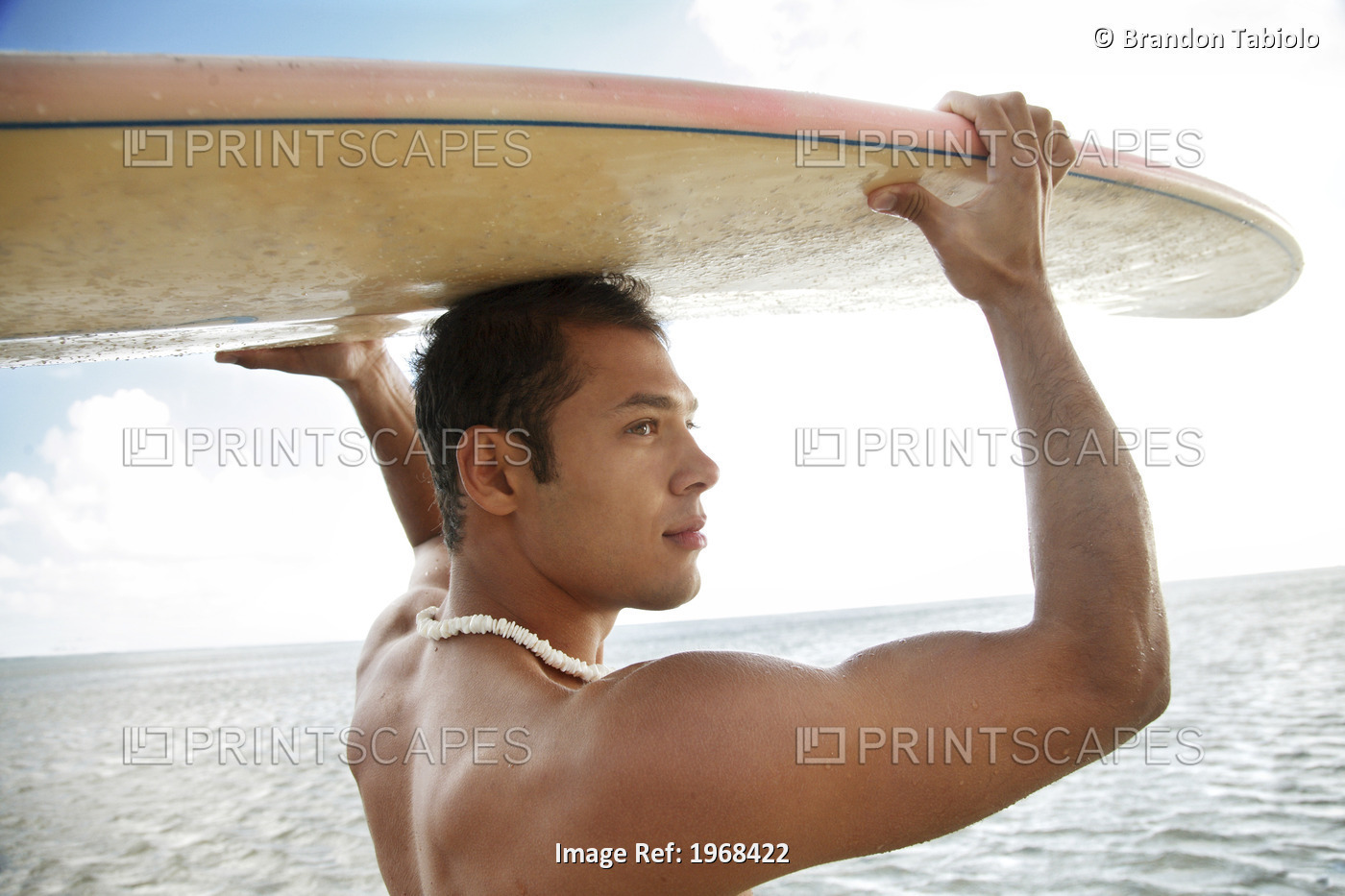 Hawaii, Oahu, Male Holding His Surfboard At The Beach.