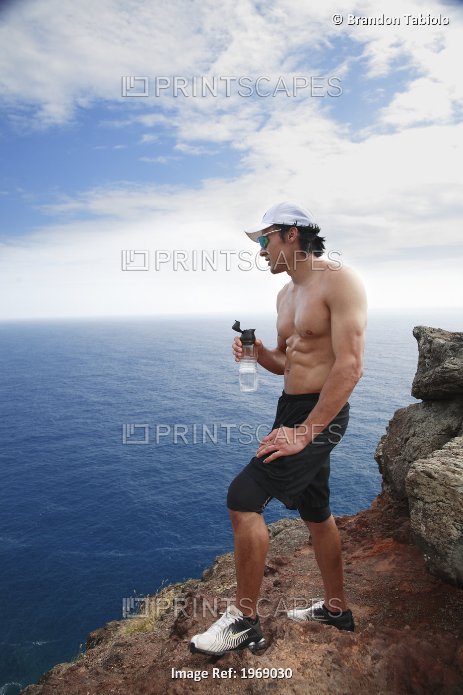 Hawaii, Oahu, Makapuu, Athletic Male Holding Water Bottle Taking A Break At ...