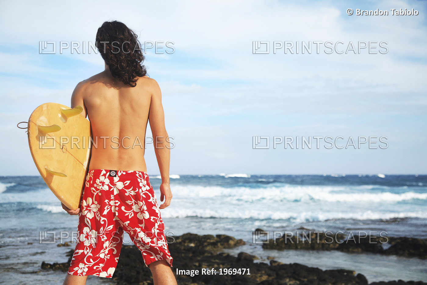 Hawaii, Oahu, Young Man At The Beach With Surfboard.