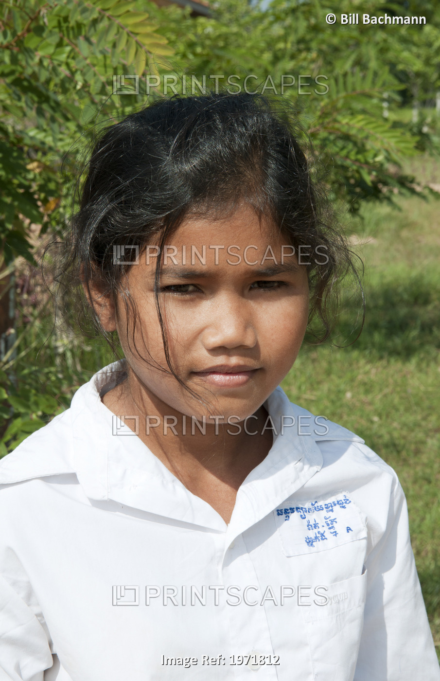 South East Asia, Cambodia, Siem Reap, A Young Girl Poses For A Picture During A ...