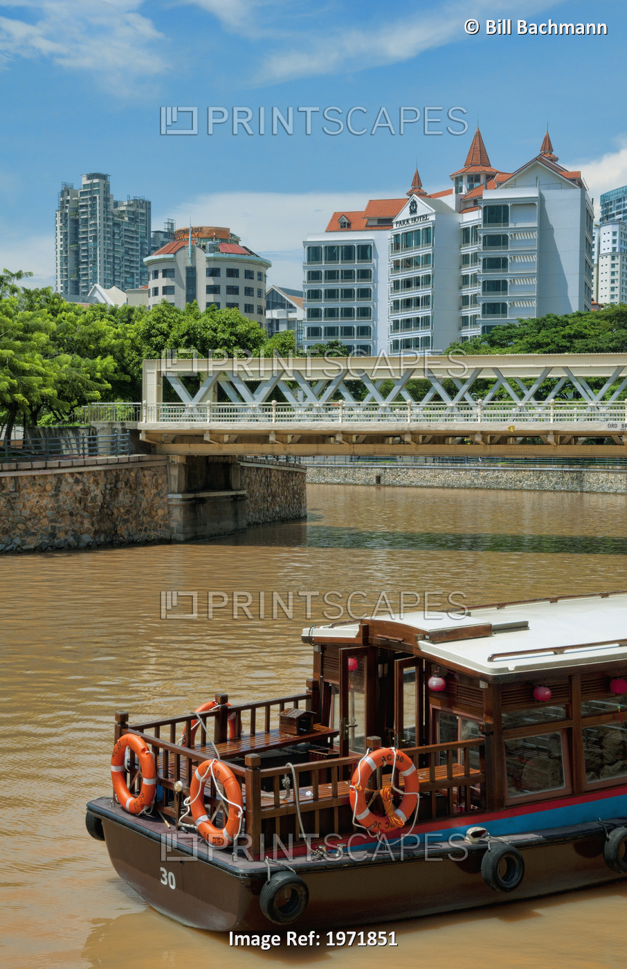 South East Asia, Singapore, View Of Downtown, Boat Traveling On River.