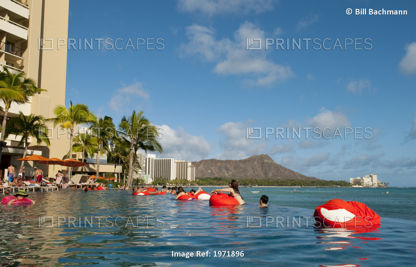 Hawaii, Oahu, Waikiki, Visitors Play And Float At The Sheraton Hotel Pool.