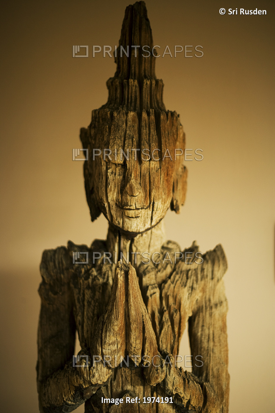 Close-Up On A Wooden Buddha Sculpture (Sepia Photograph).