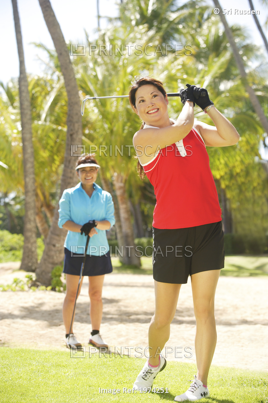 Hawaii, Oahu, Two Woman Enjoying A Day Of Golf.