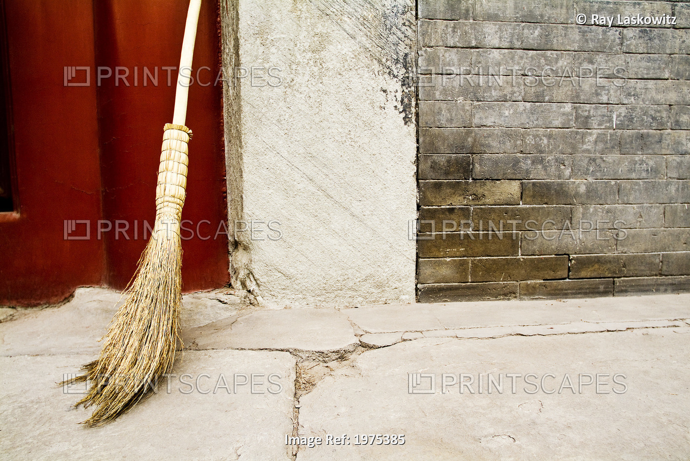 China, Broom Leaning Against Cement Wall; Beijing