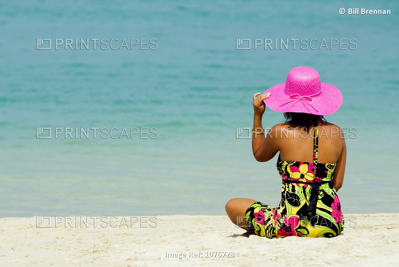 Thailand, Phuket, Kata Noi, Woman In Colorful Dress And Hat Sitting On Tropical ...