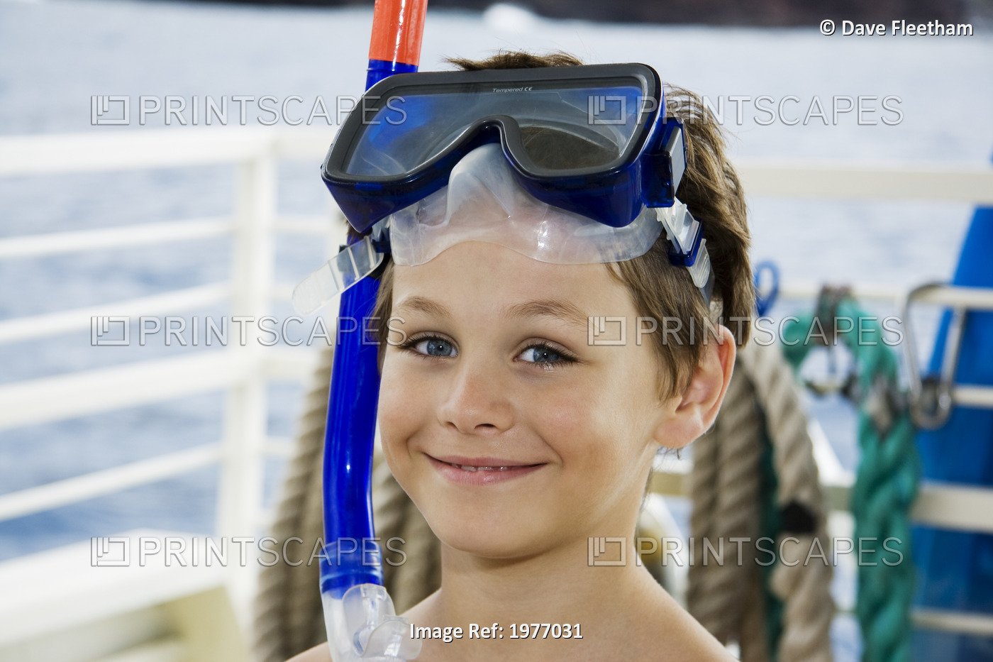 USA, Hawaii, Maui, Smiling Young Boy Prepares To Go Snorkeling; Lanai
