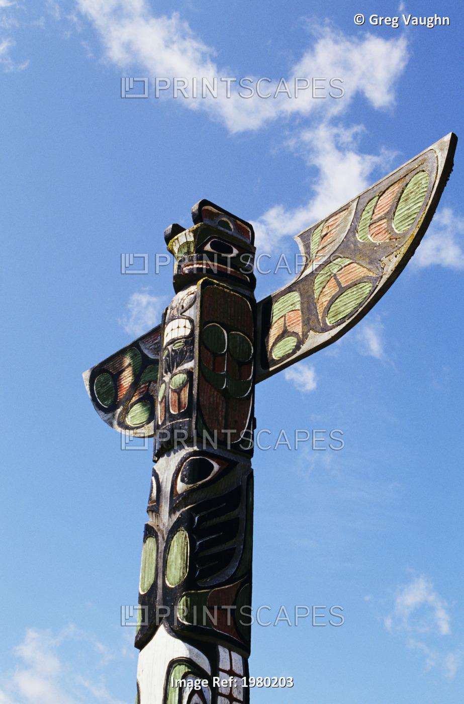 USA, Washington, Olympic Peninsula, Totem pole and blue sky at Makah Indian ...