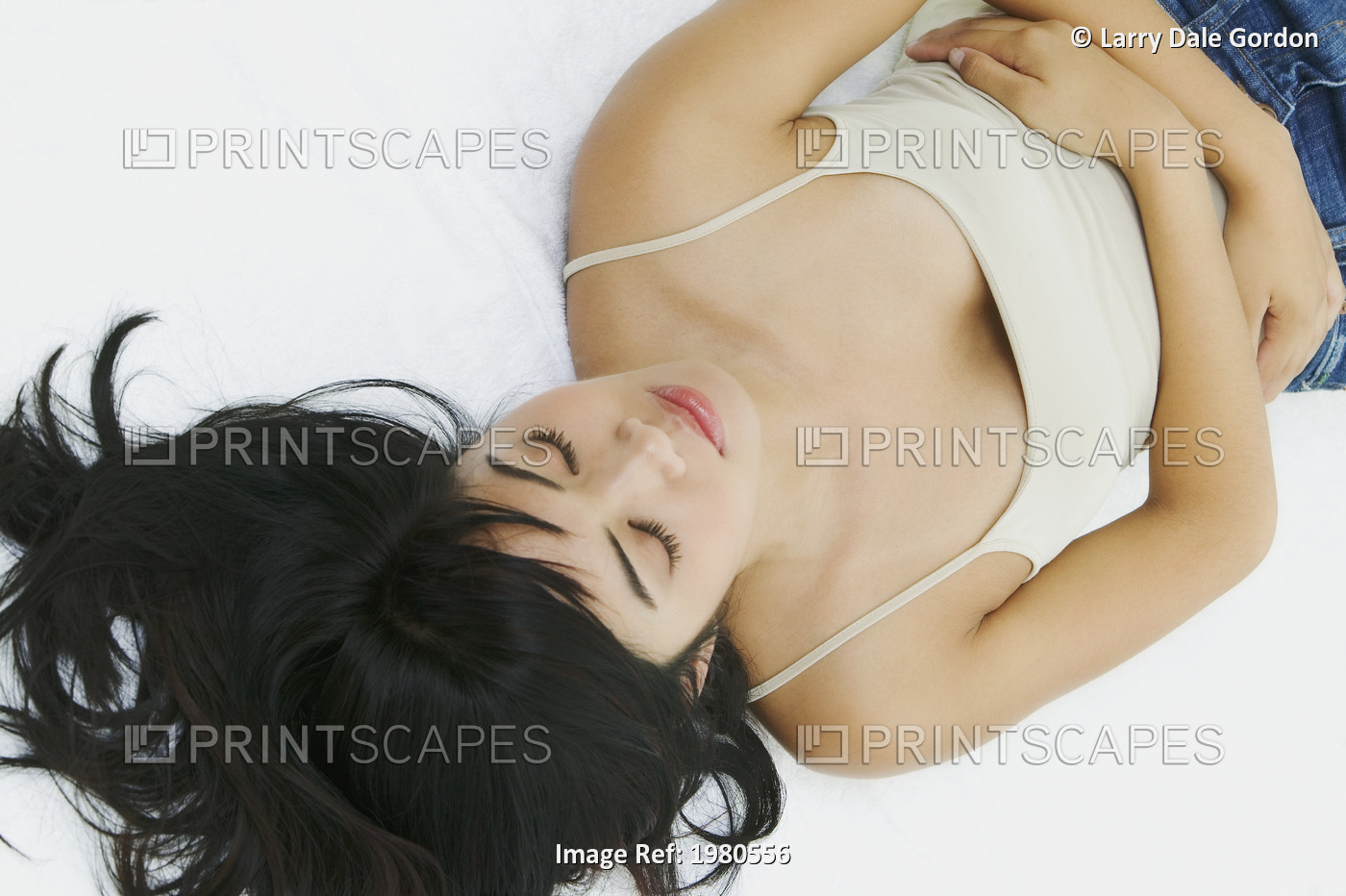 Close-Up Of A Beautiful Asian Woman Laying Down.