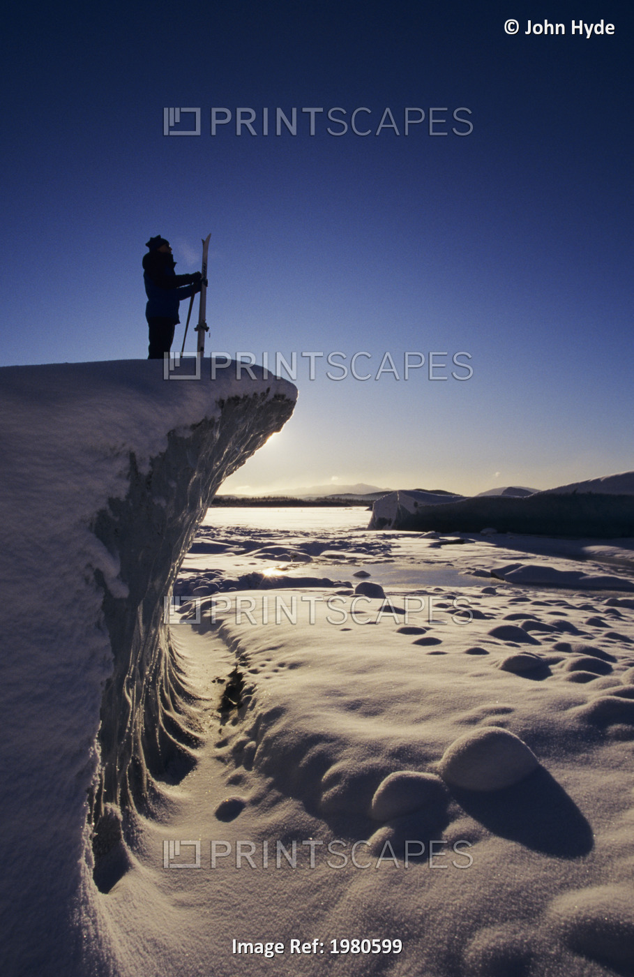 USA, Alaska, Skier overlooking snowy landscape at Mendenhall Glacier; Juneau