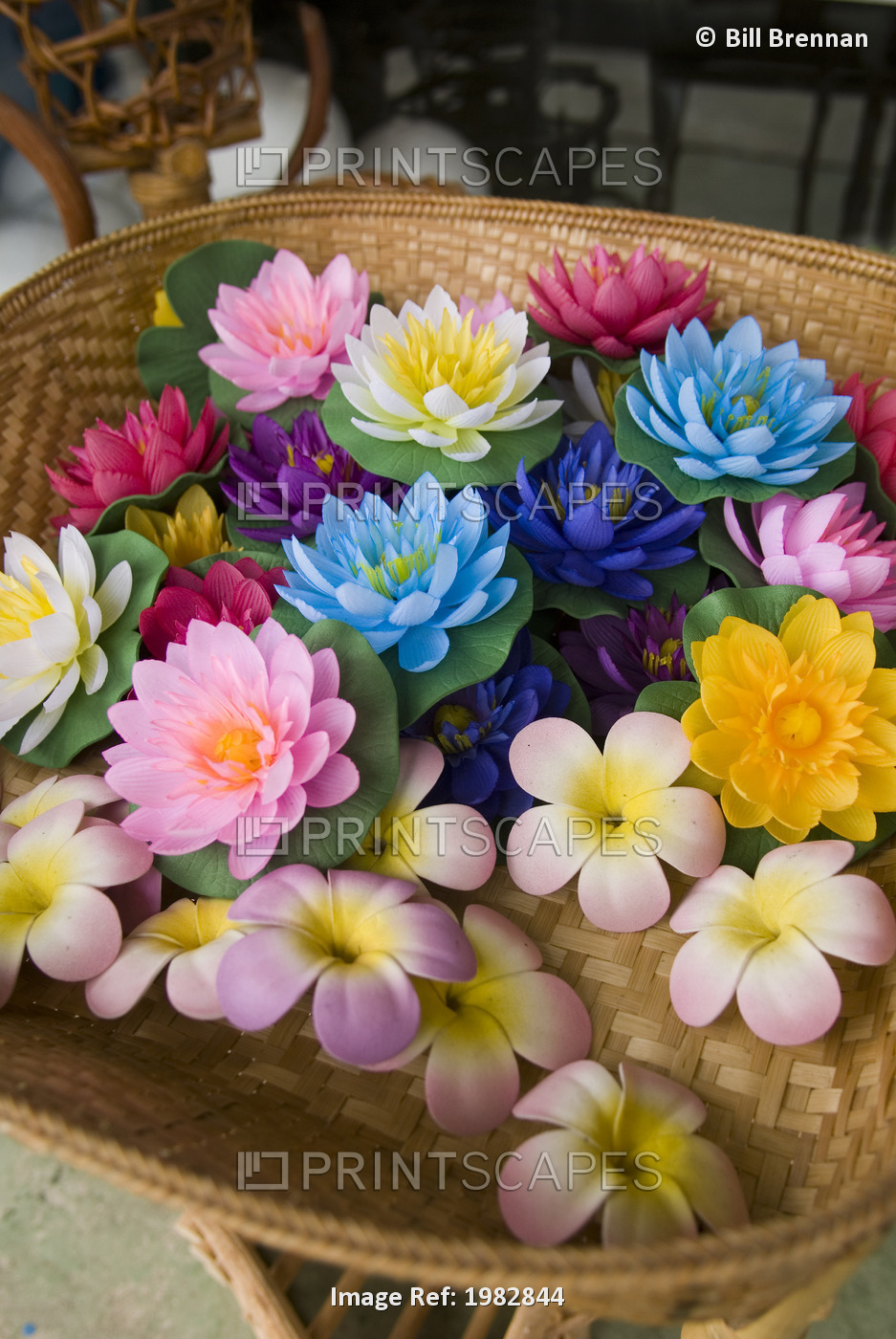 Silk flowers in a basket; Mae Sariang, Thailand