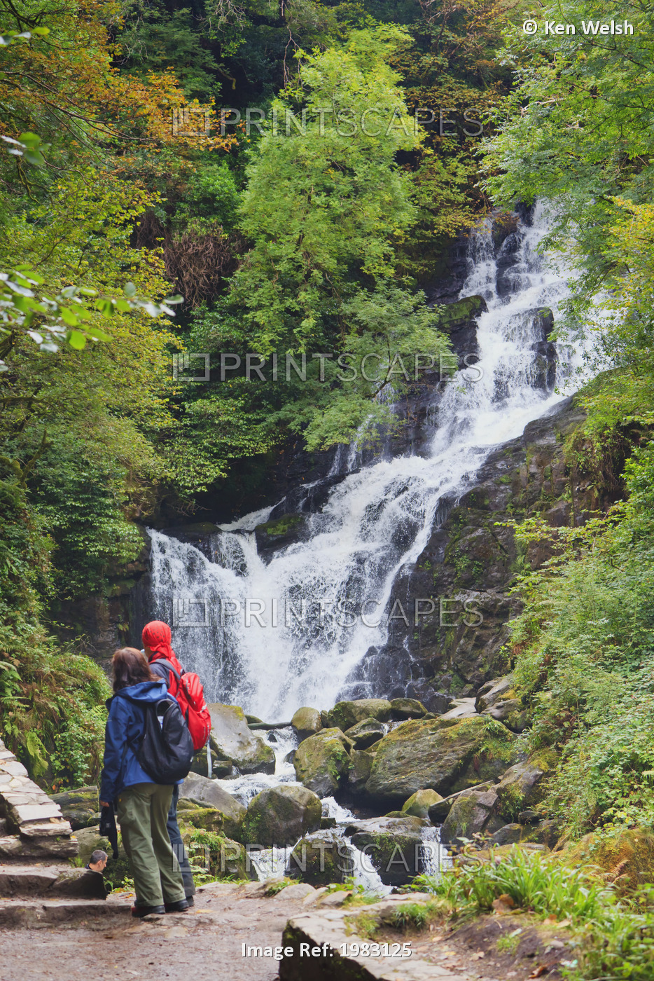 Visitors Taking Photographs Of Torc Waterfall In Killarney National Park; ...