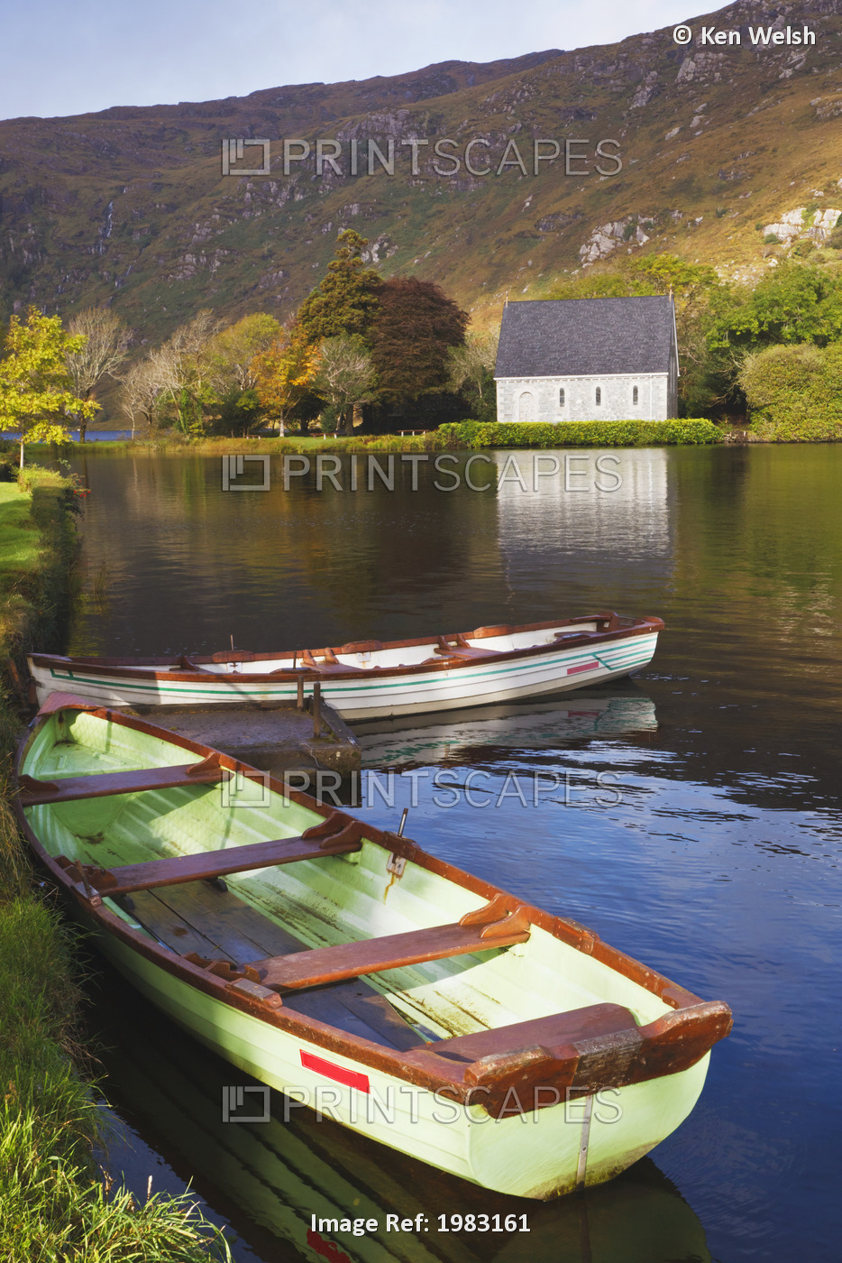St. Finbarre's Oratory And Rowing Boats On Shore Of Gougane Barra Lake In ...