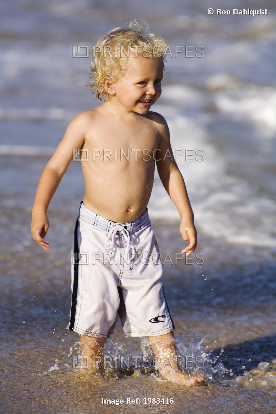 Hawaii, Maui, Baldwin Beach, Adorable Little Boy Playing At The Waters Edge.