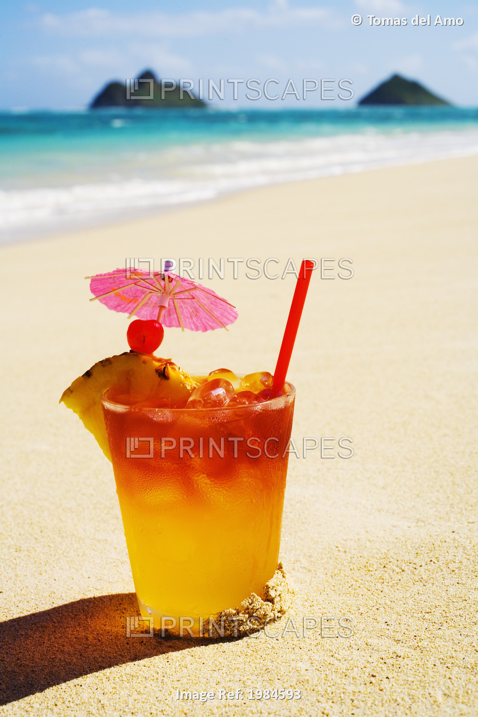 A Mai Tai Garnished With Pinapple And A Cherry, Sitting In The Sand On The ...