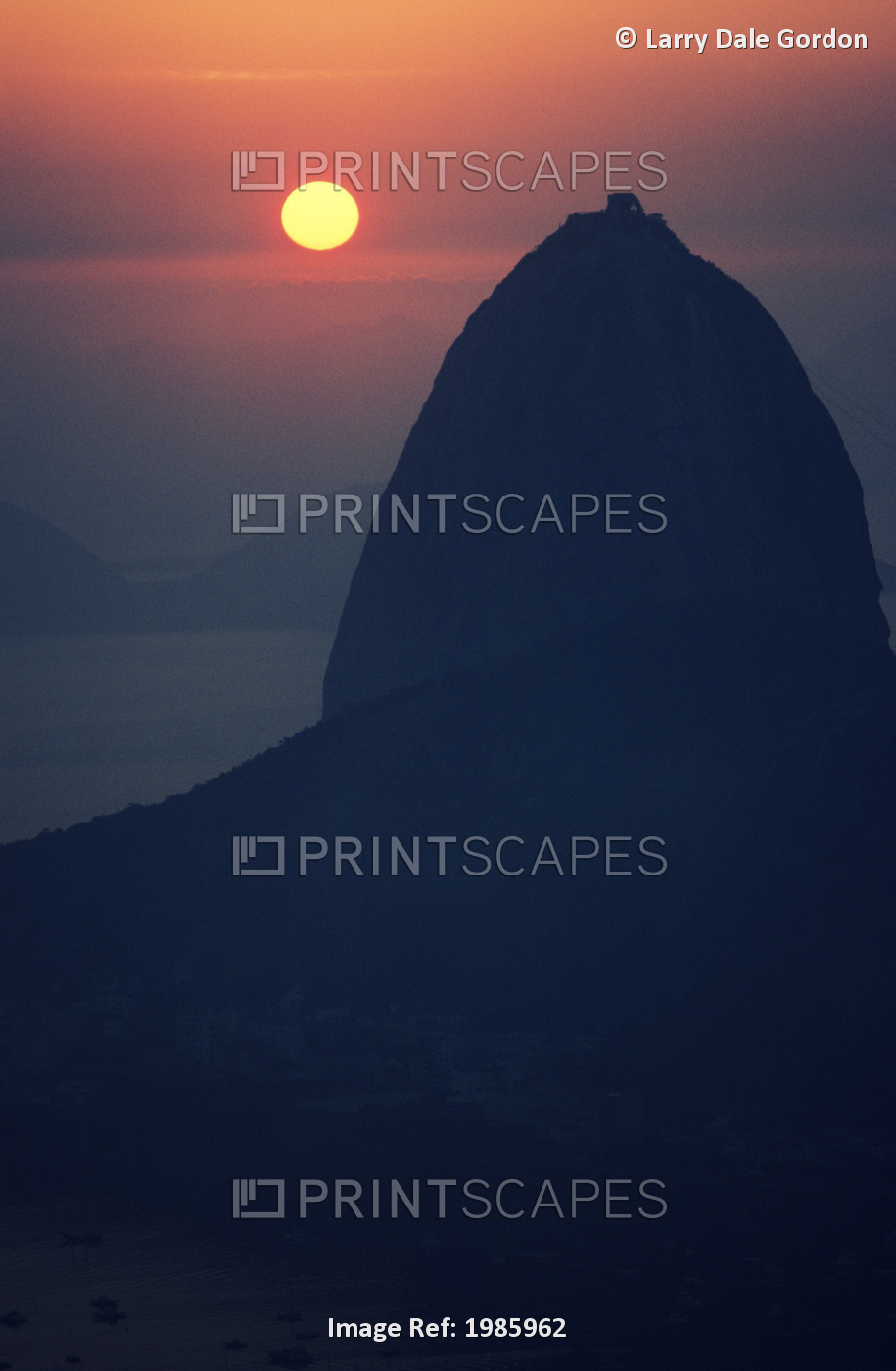 Brazil, Rio De Janeiro, Sugarloaf Mountain Silhouetted At Sunset.