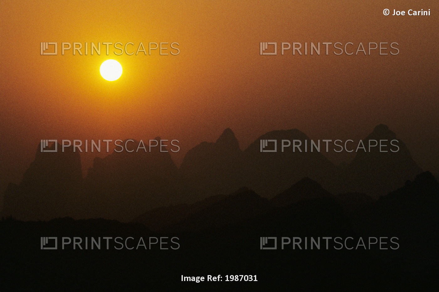 China, Guilin, Piled Silk Mountains, Orange Misty Sunset.