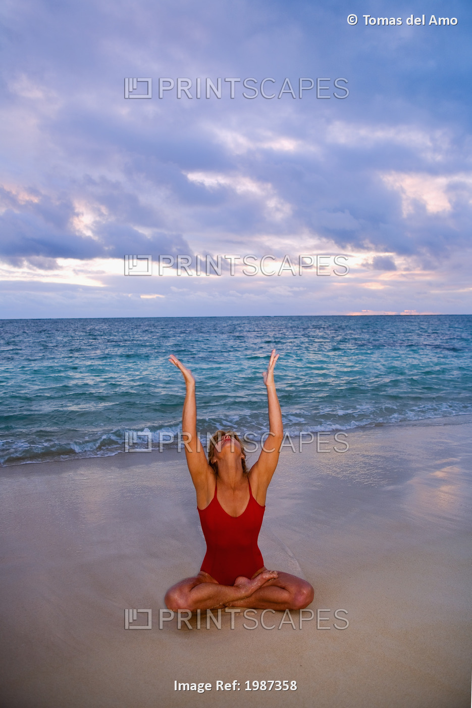 Hawaii, Oahu, Lanikai, Woman Doing Yoga On The Beach At Sunrise.