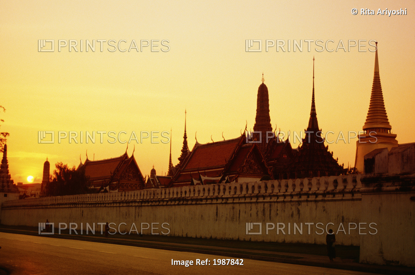 Thailand, Royal Palace complex seen from outside gate at sunrise; Bangkok