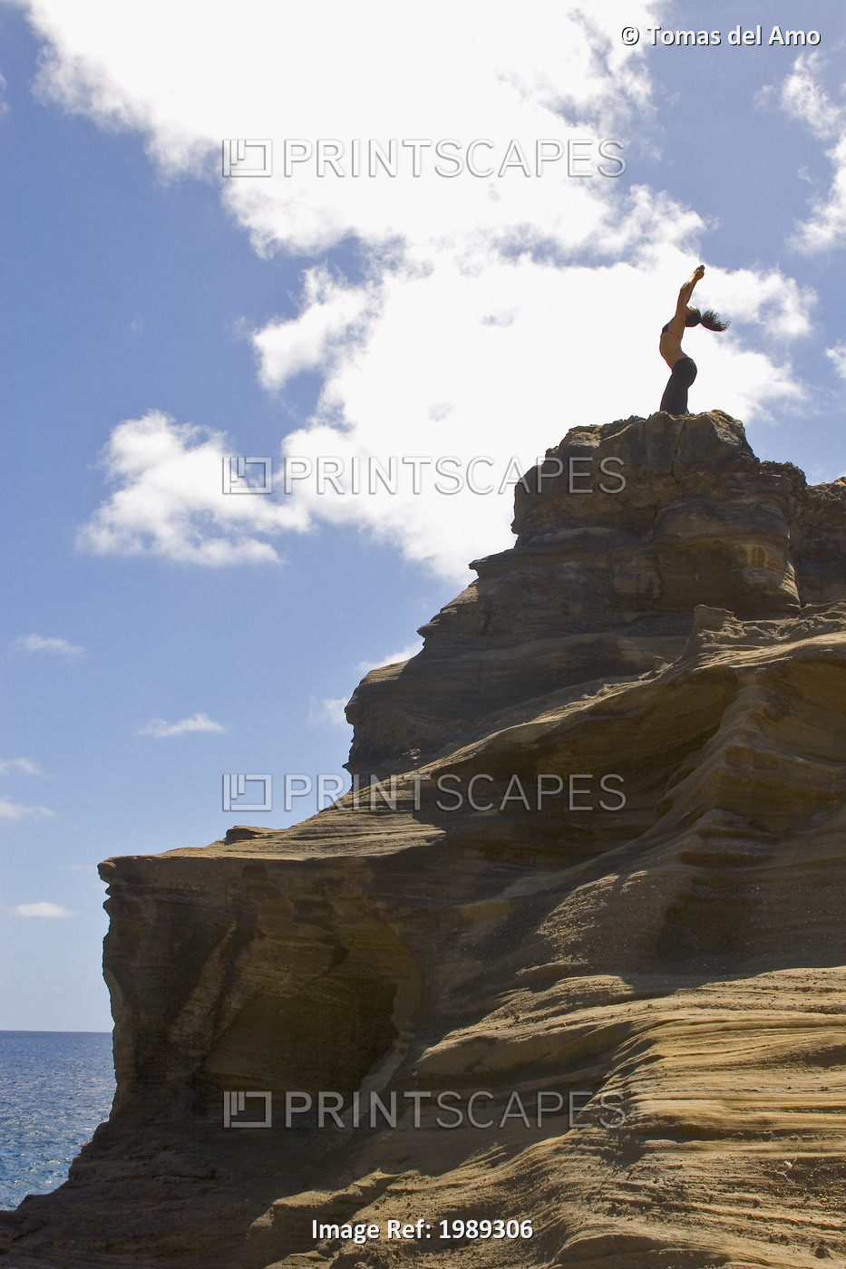 Hawaii, Oahu, Young Woman Doing Yoga On A Cliff Next To The Ocean.