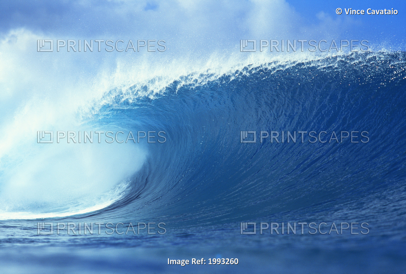 Closeup Of Blue, Glassy Wave Curling Over.