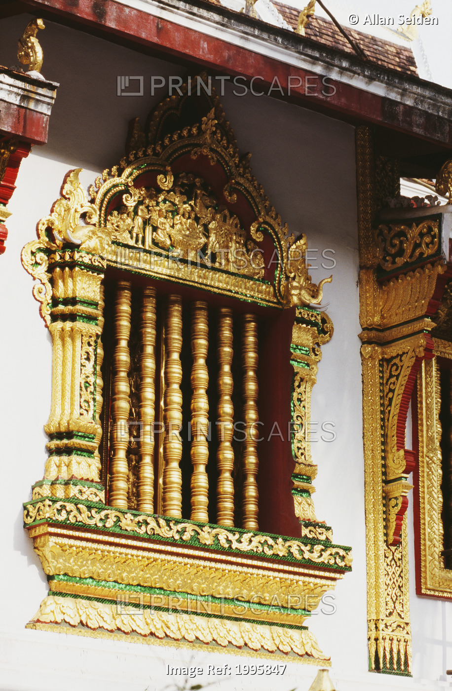 Laos, Luang Prabang, Wat Xien Thong, Intricately Carved Temple Window.