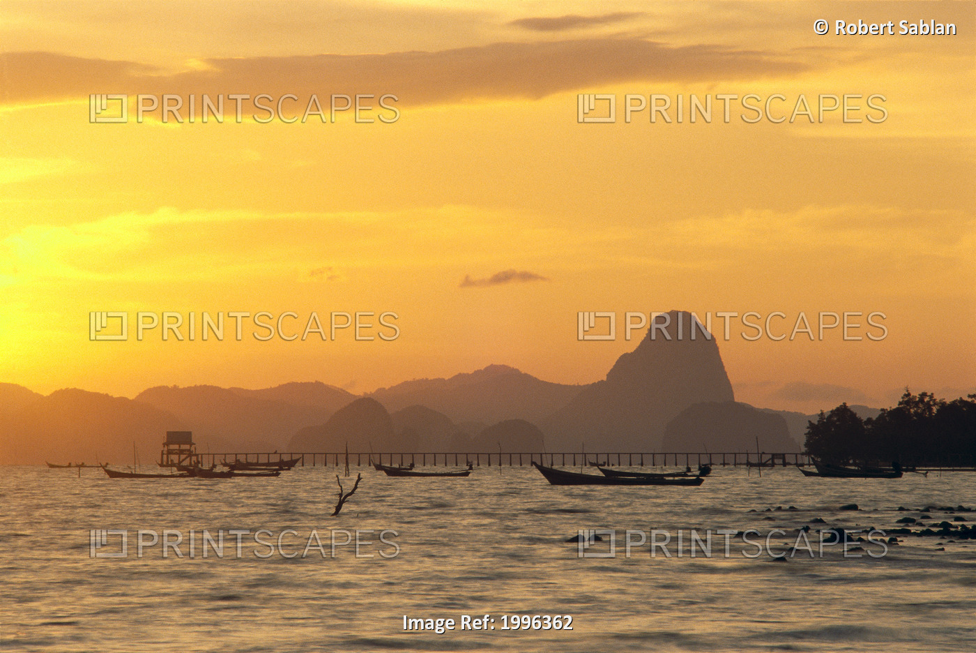 Thailand, Phangna Bay, Boats Anchored, Pier And Mountains At Sunset Golden ...