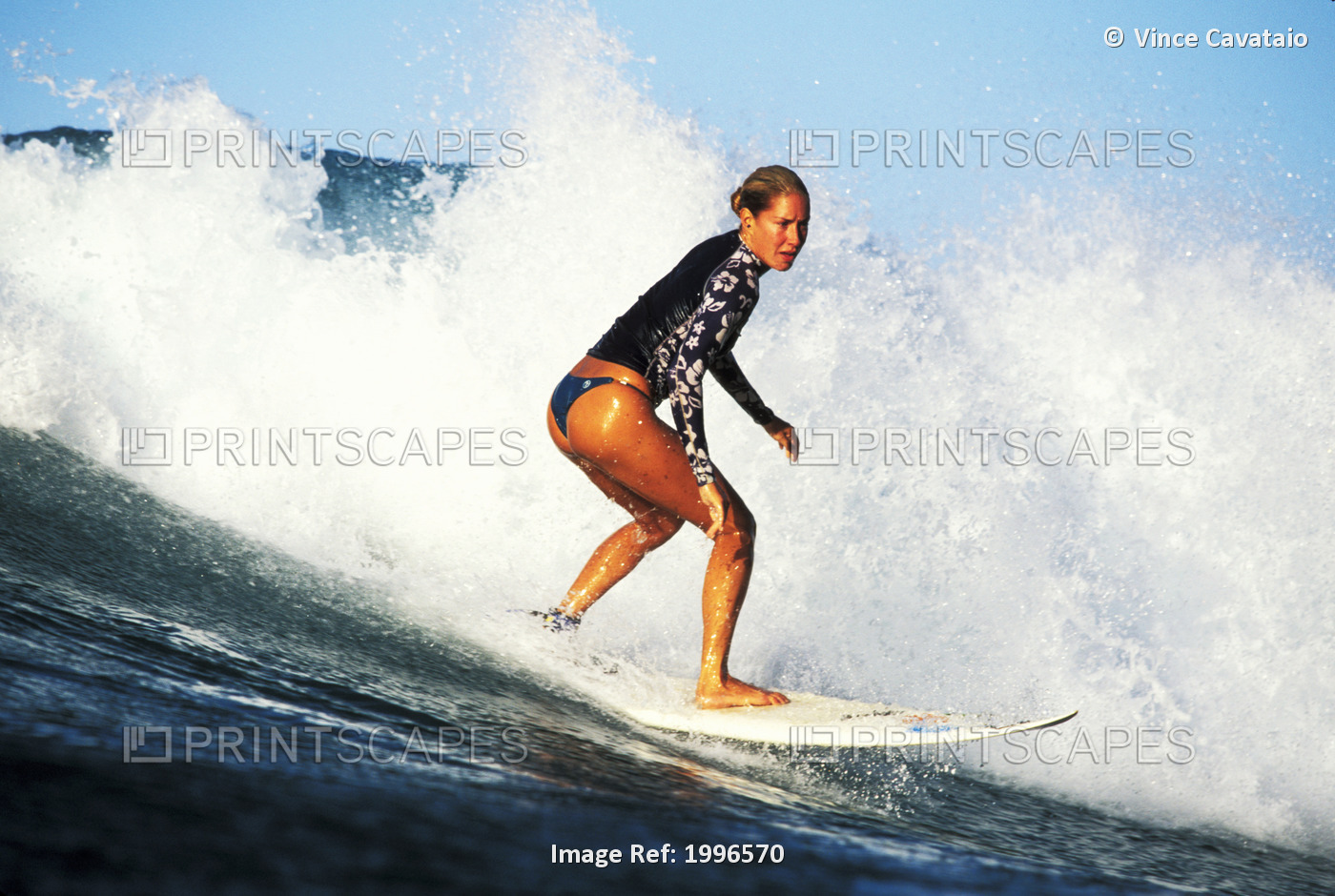 Hawaii, Local Woman Surfing Wave With Whitewater Spray