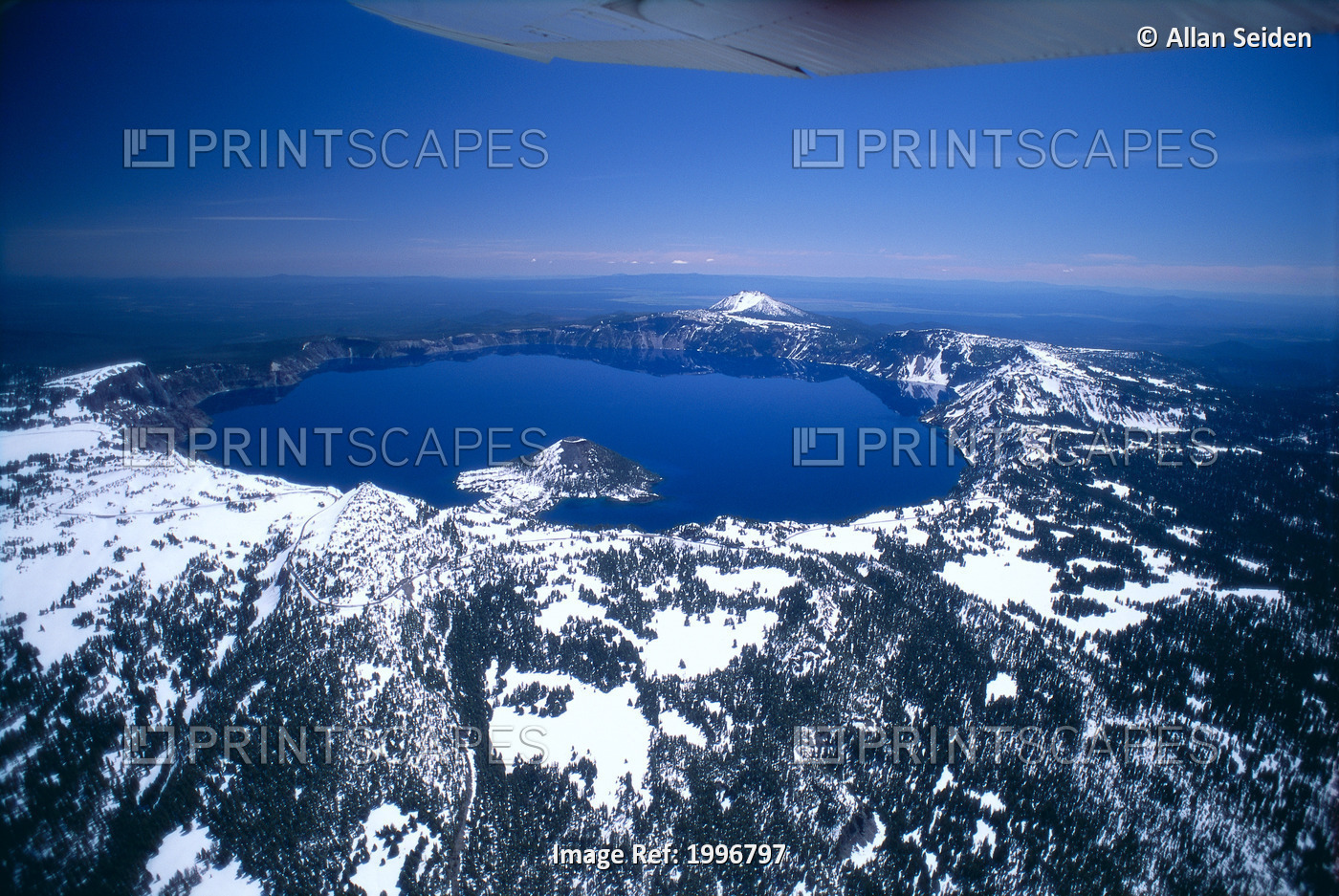 Oregon, Crater Lake, Aerial Overview, Snow Scattered, Clear Blue Sky Background ...