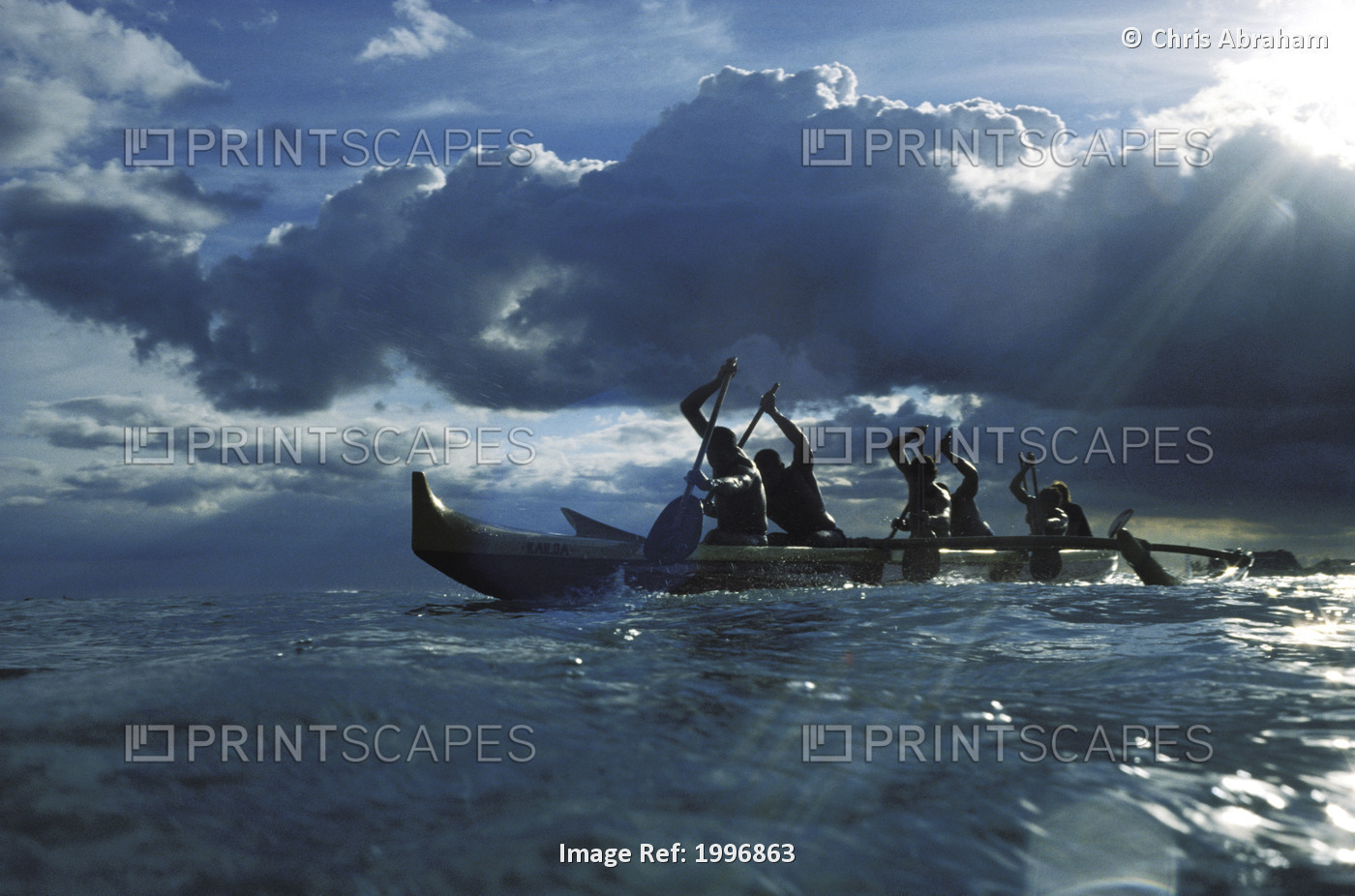 Hawaii, Ourigger Canoe Paddlers At Sunset, Rays Of Light Break Through Dramatic ...
