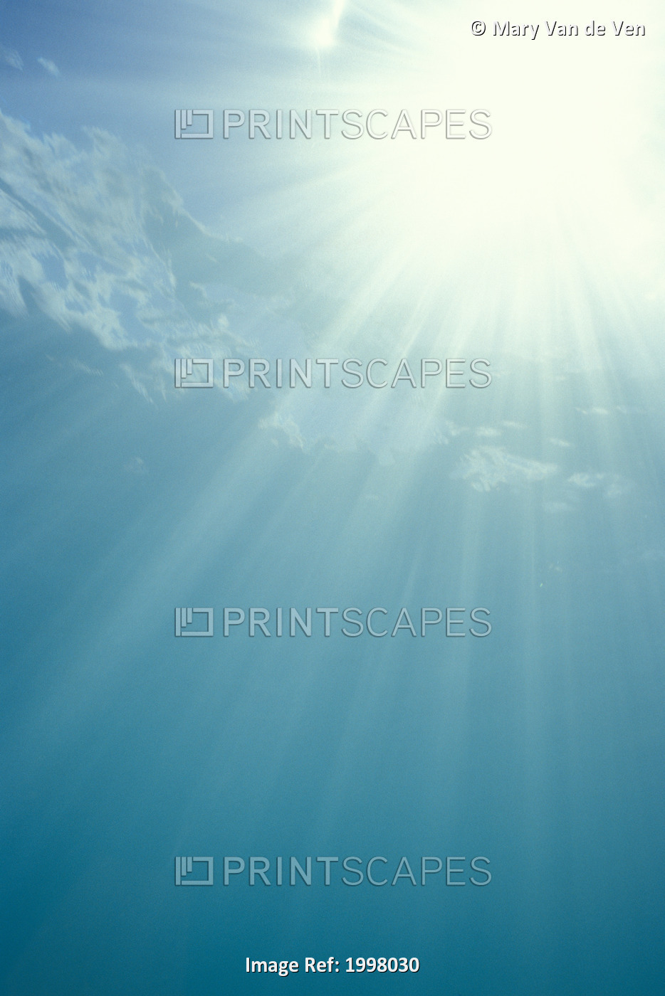 Brilliant Sunburst Through Water Surface With Sunrays, View From Underwater