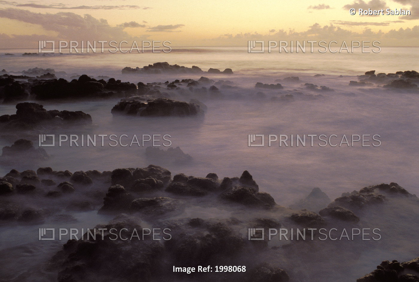Hawaii, Molokai, Kau Poa Beach, Lava Rocks In Foggy Layer Over Pale Sunrise ...