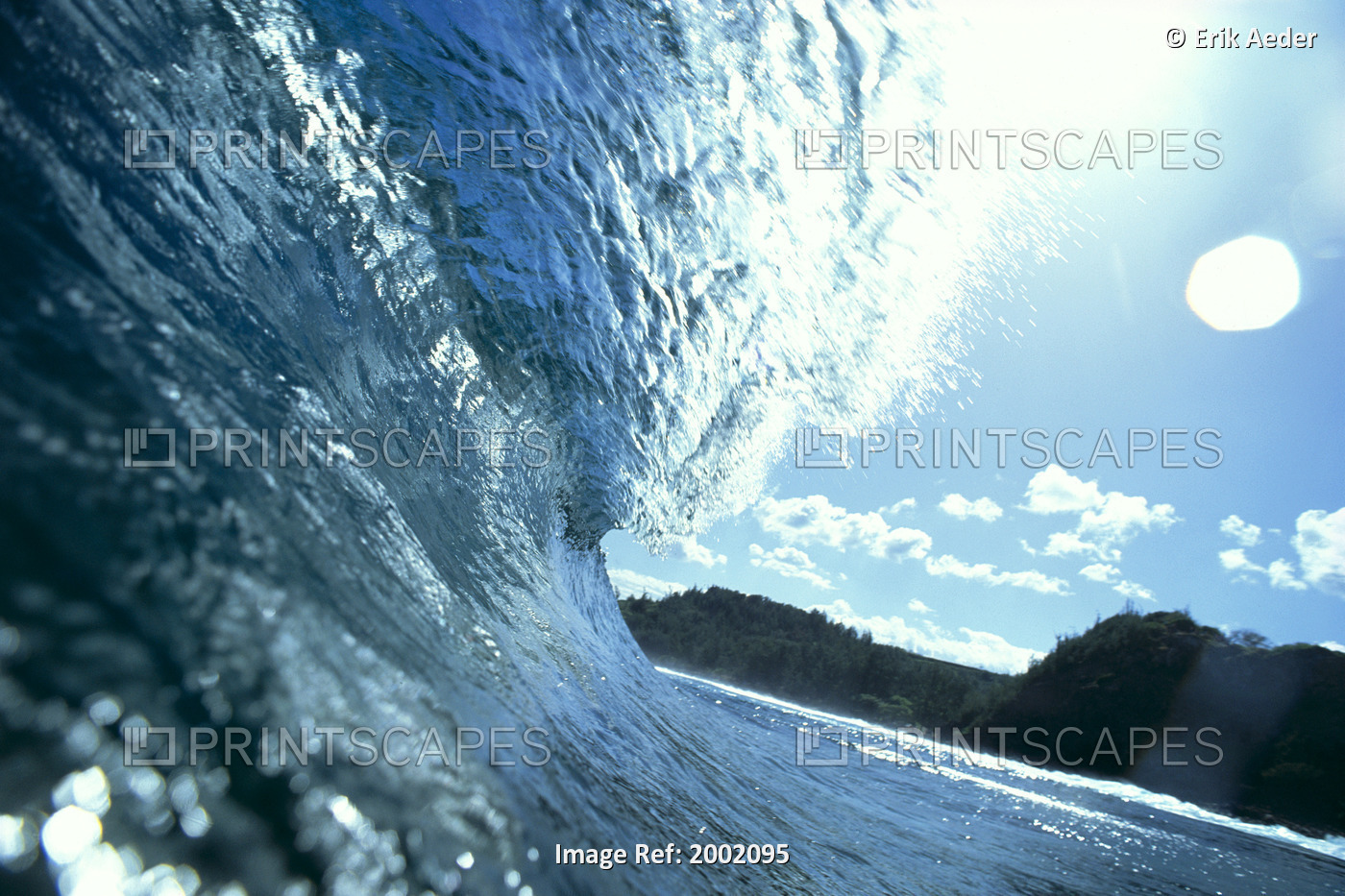 Translucent Curling Blue Wave Backlit, Shimmery Waters, Land In Background