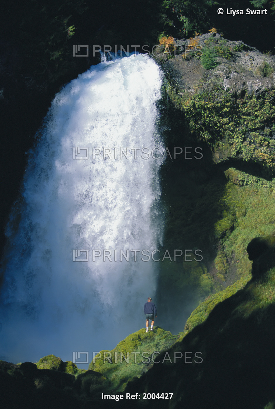Oregon, Sahalie Falls, View Of The Falls Man Walking In Foreground
