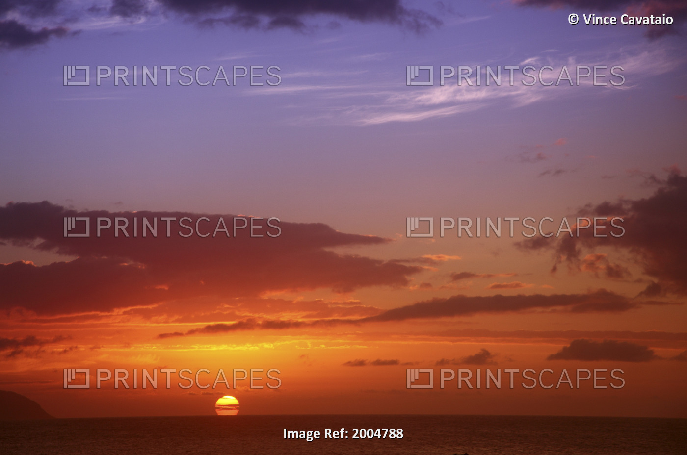 Hawaii, Oahu, North Shore, Dynamic Sunset, Sun Sinking Below The Horizon.