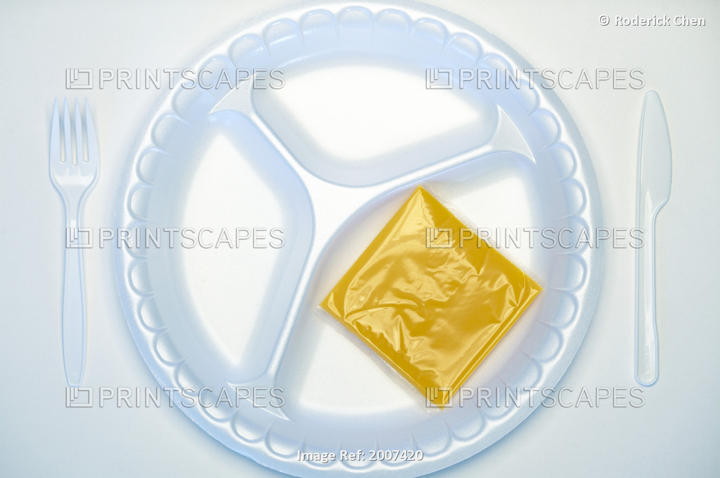 Plastic Place Setting And Processed Cheese