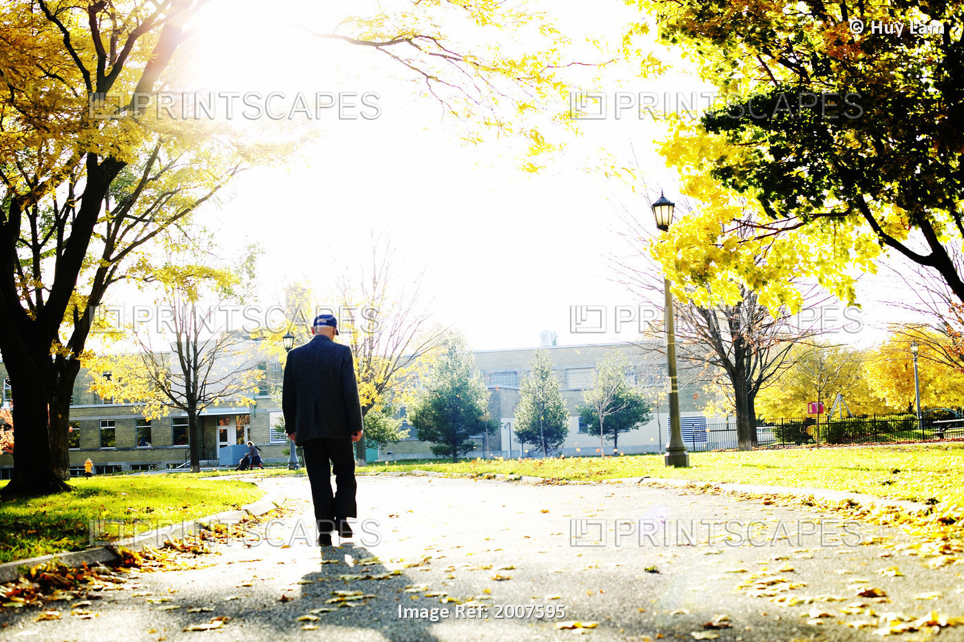 Man Walking Along Path In Autumn, Toronto, Ontario