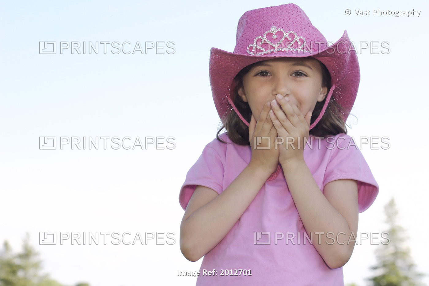 Young Girl Wearing Pink Cowboy Hat