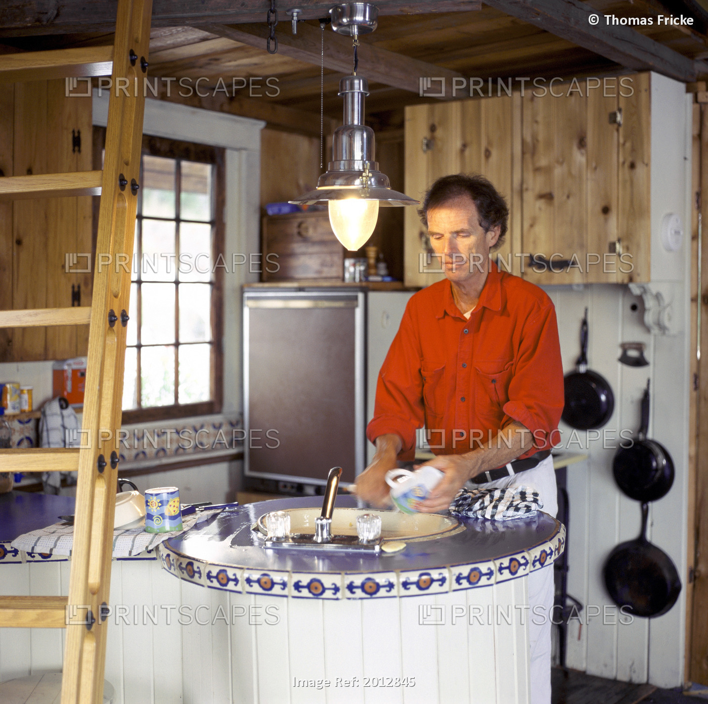 Man In Cottage Kitchen, Gunn Lake, Minaki, Ontario