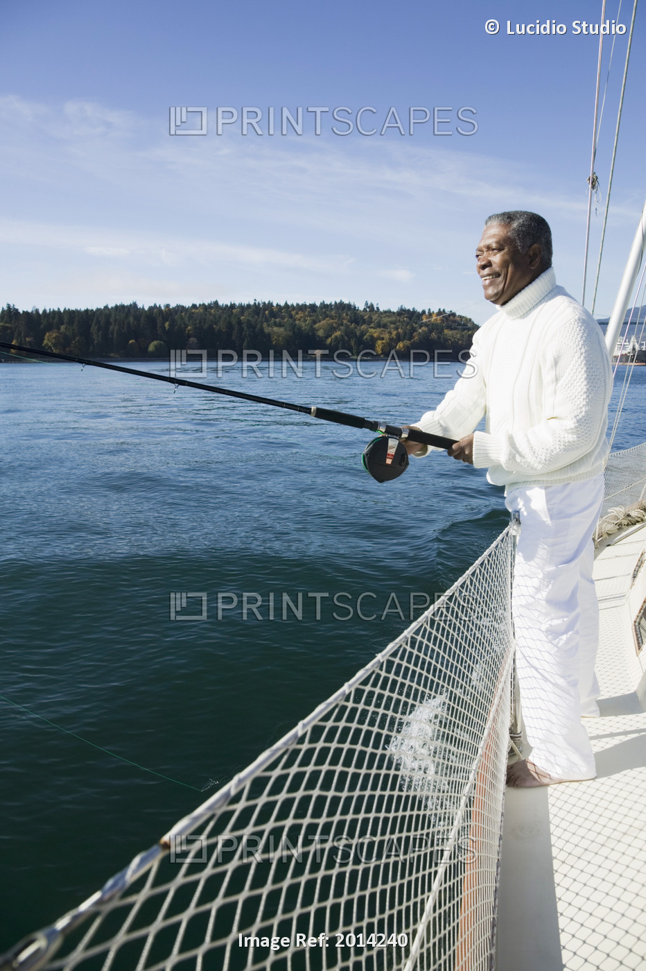 Senior Man Fishing Off His Sailboat, Vancouver Harbour, Bc